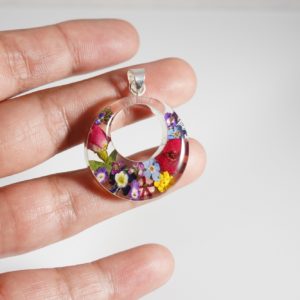Captured Nature in Resin – Floral Crescent Pendant
