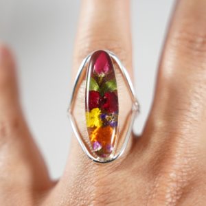 Captured Nature in Resin – Nature Ring Long Oval with Assorted Flowers Adjustable Size